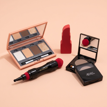 Beauty & Makeup: a group of salon products on a light peach pink background