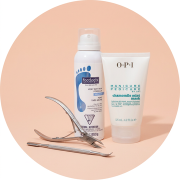 Manicure & Pedicure: a group of salon products on a light peach pink background